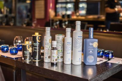 Greek extra virgin olive oil bottles prepared for an olive oil tasting experience in Athens.